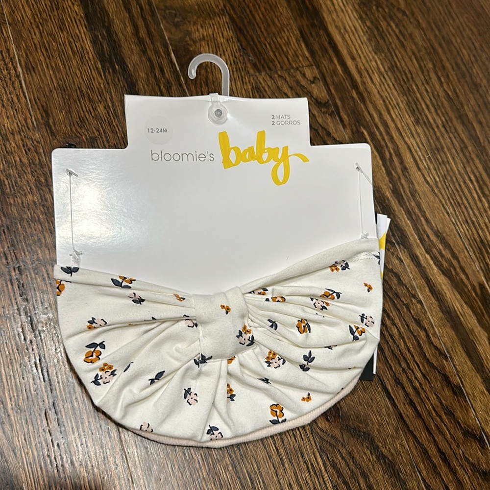 Two baby girl hats